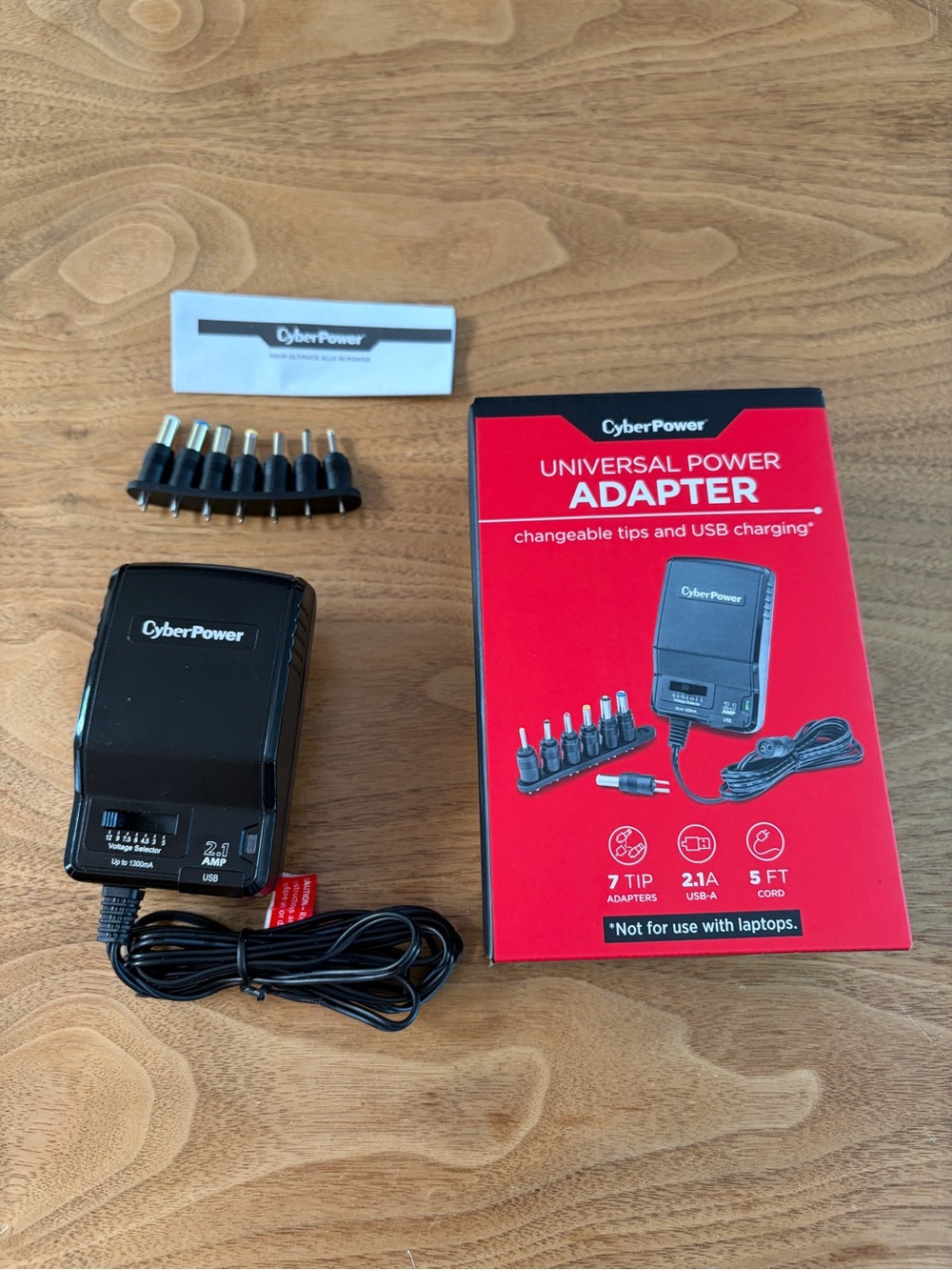 NIB universal power adapter with changeable tips and USB charging